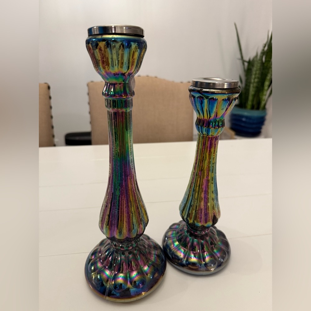 Beautiful glass iridescent mermaid and peacock color candle holders.